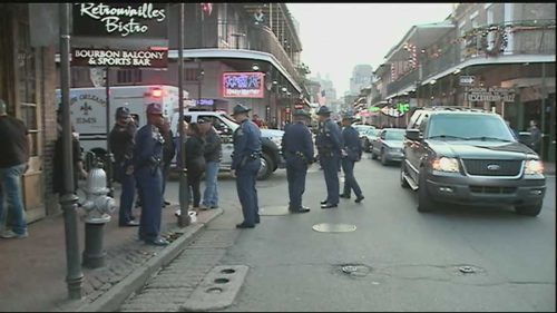 Security Officers Stand on Bourbon Street